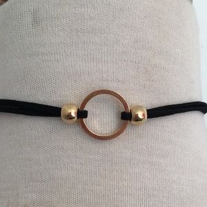 black faux suede choker with gold ring